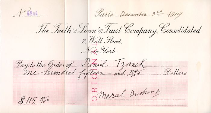 Marcel Duchamp                                                                                                                                                                                                                                                  Marcel Duchamp, <i>Tzanck Check</i> (<i>Boîte-en-valise</i>’den detay), 1919/1938
Matbu faksimile, sanatçı eliyle nümeratörle damgalanmış iki renkli ofset litograf, 21x38.2 cm
Francis M. Naumann Fine Art, New York izniyle
© Marcel Duchamp veraseti, 2011, ADAGP, Paris/ARS, New York